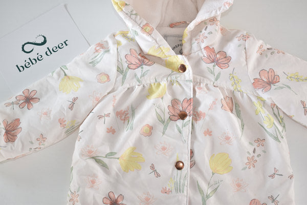 Raincoat with a pastel floral print