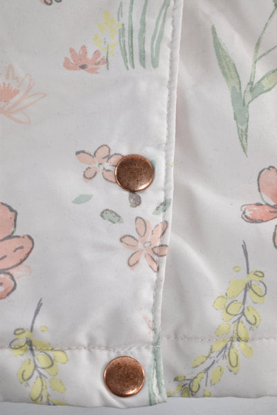 Raincoat with a pastel floral print