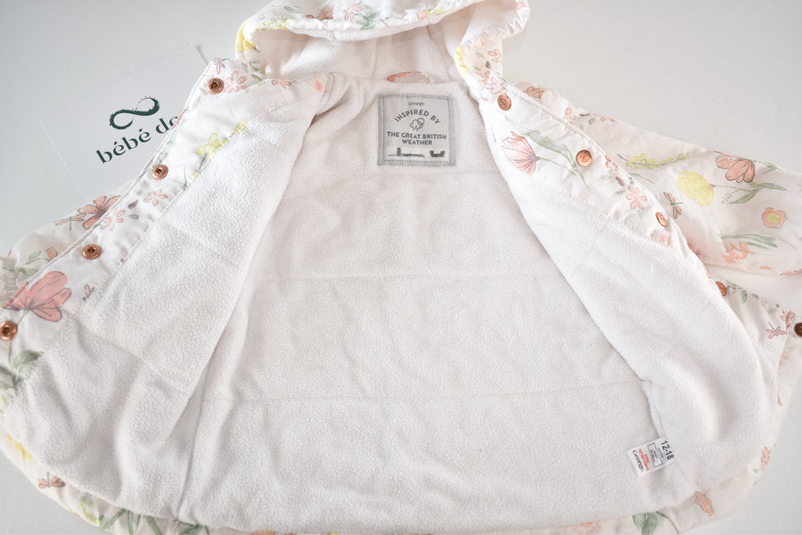 Raincoat with a pastel floral print