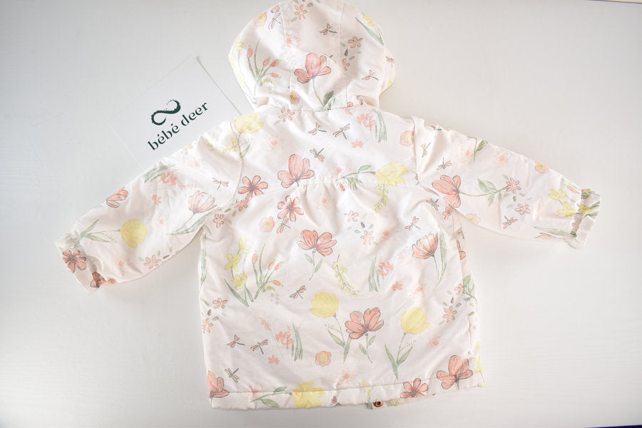 Raincoat with a pastel floral print