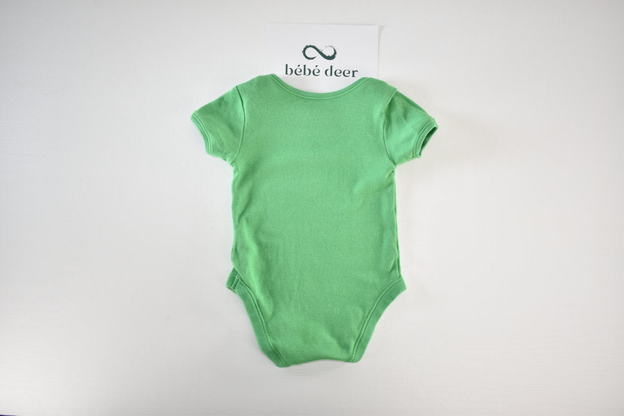 Green bodysuit with a helicopter illustration