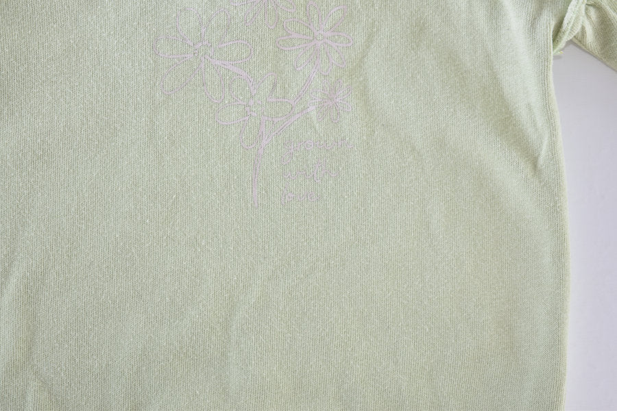 Sage green jumper with floral print