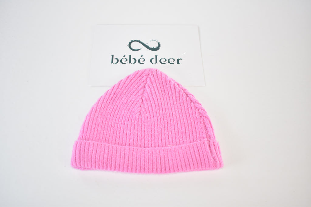 Bright pink soft knitted hat