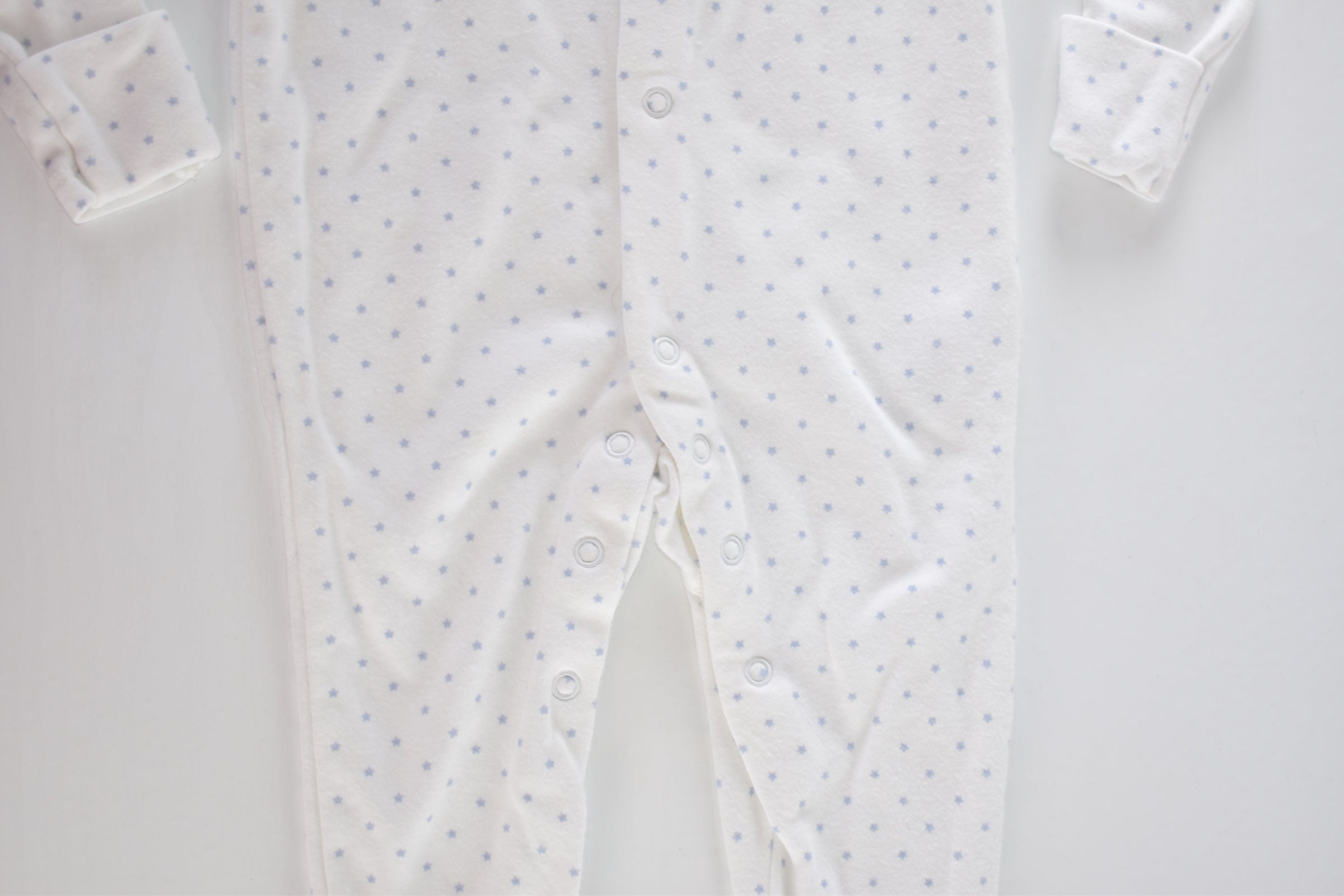 White cotton sleepsuit with blue stars