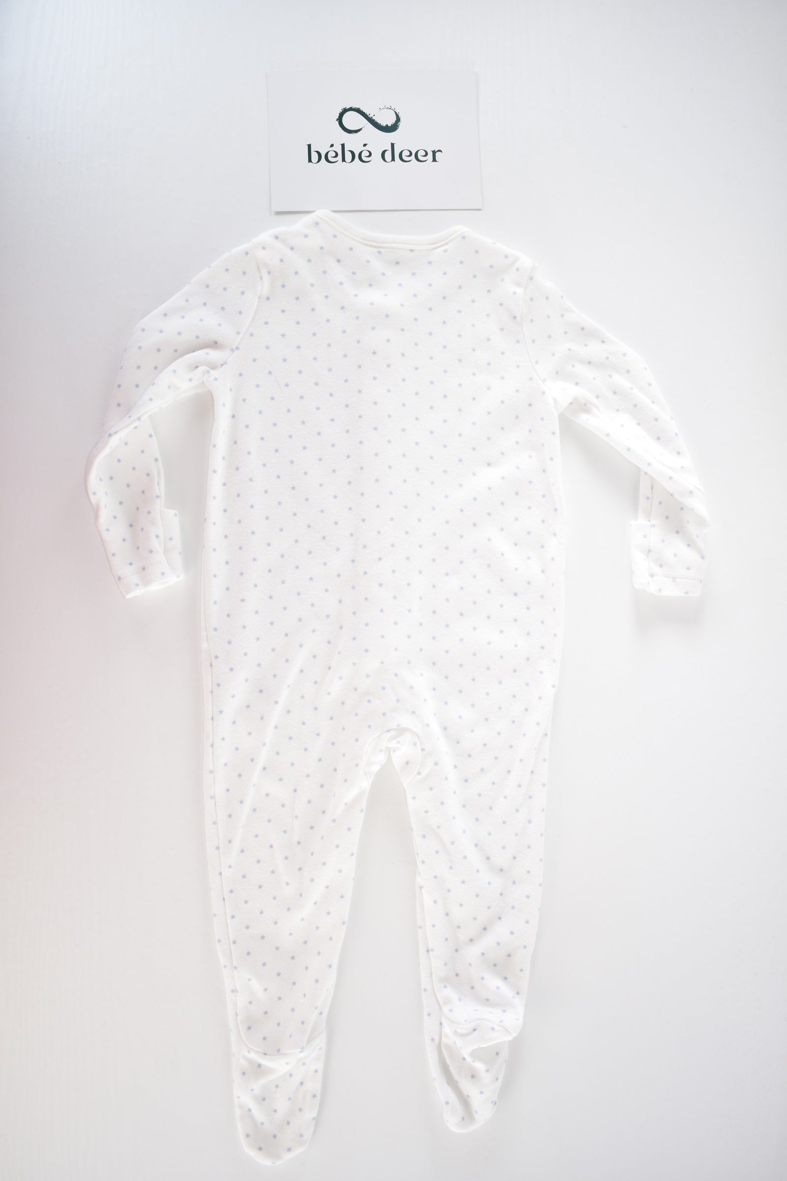 White cotton sleepsuit with blue stars
