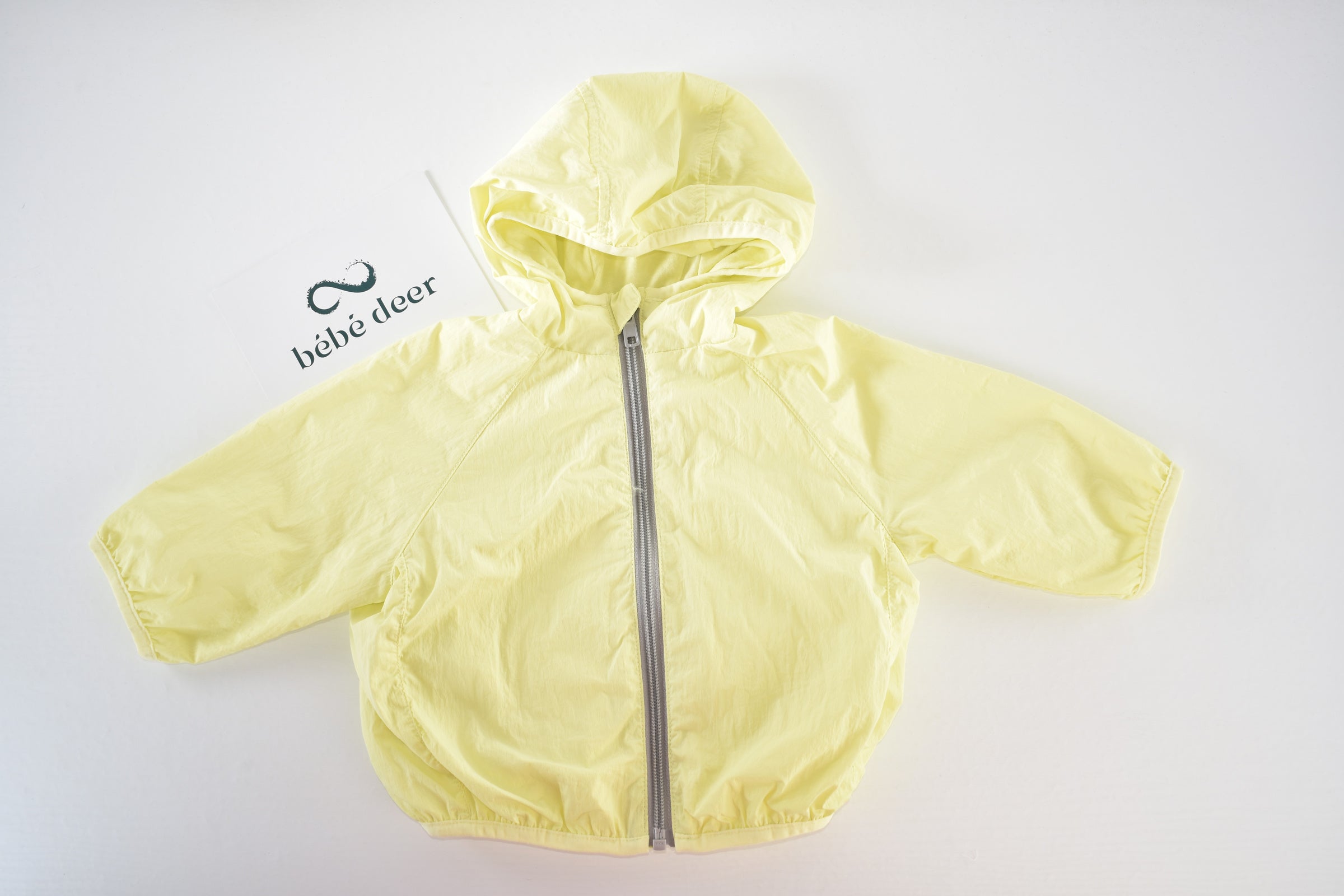Yellow hooded lightweight jacket