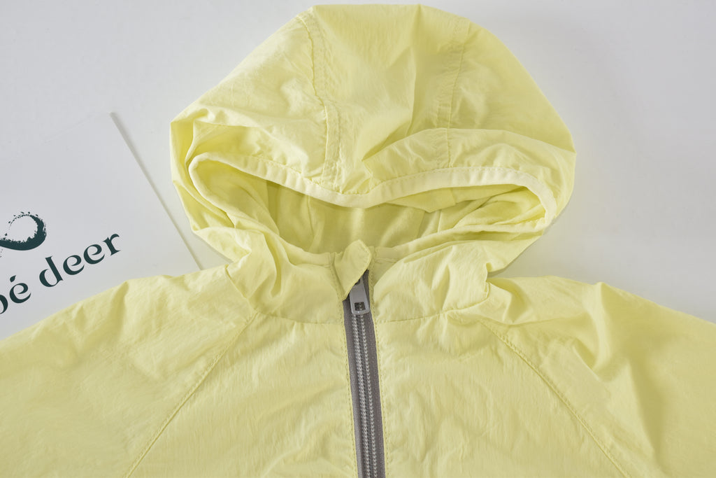Yellow hooded lightweight jacket