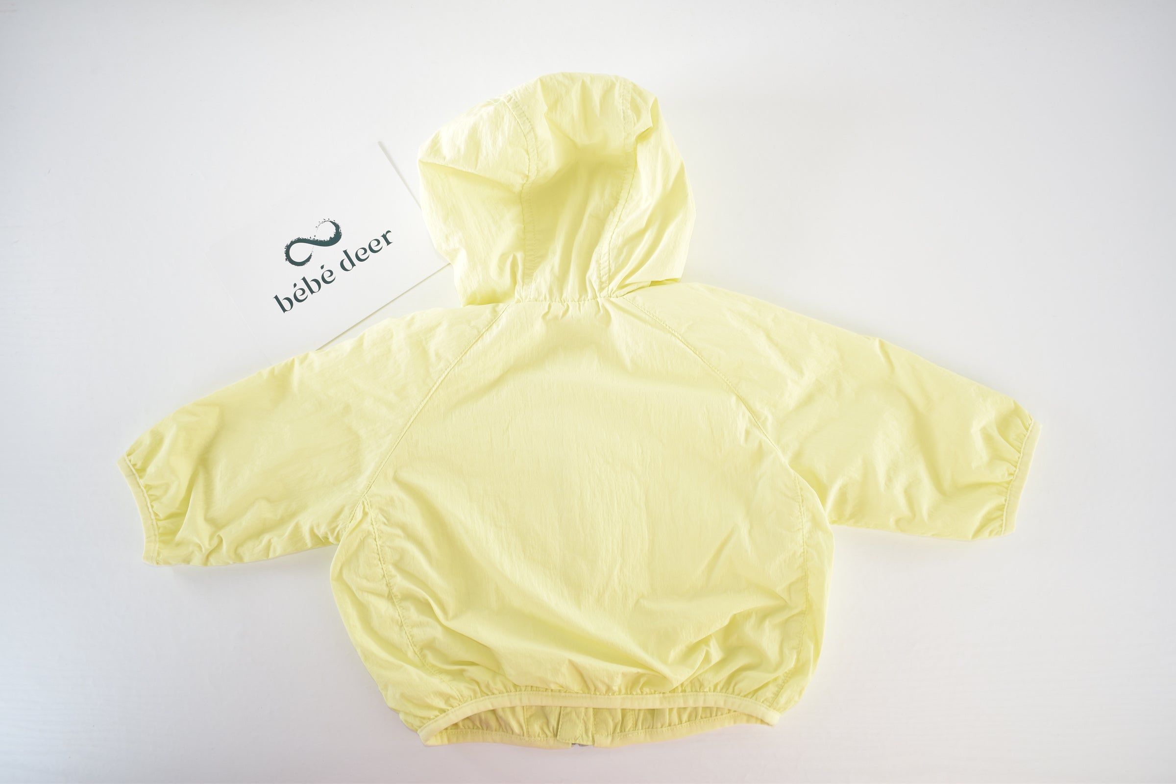 Yellow hooded lightweight jacket