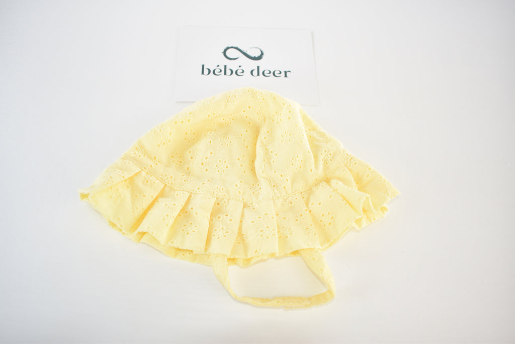 Yellow broderie sun hat – 6–12 months