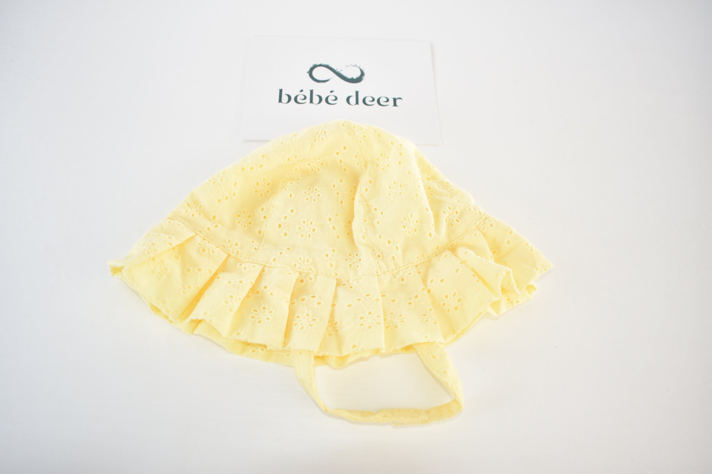 Yellow broderie sun hat – 6–12 months