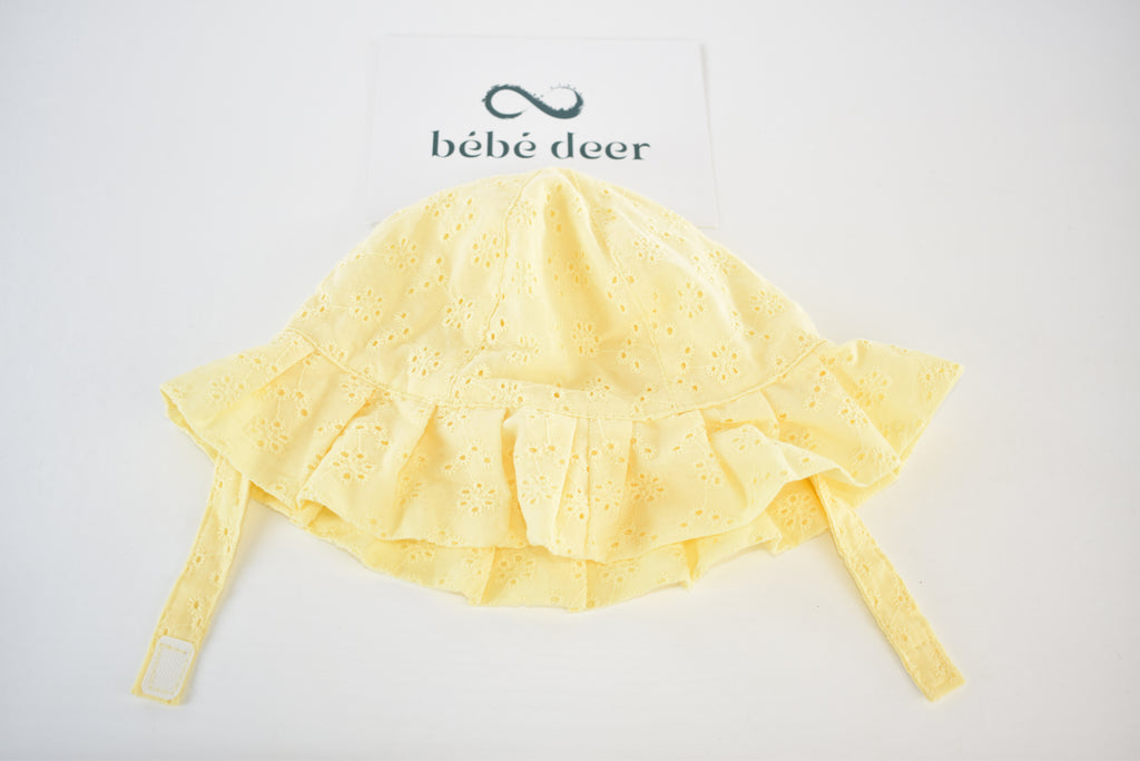 Yellow broderie sun hat – 6–12 months