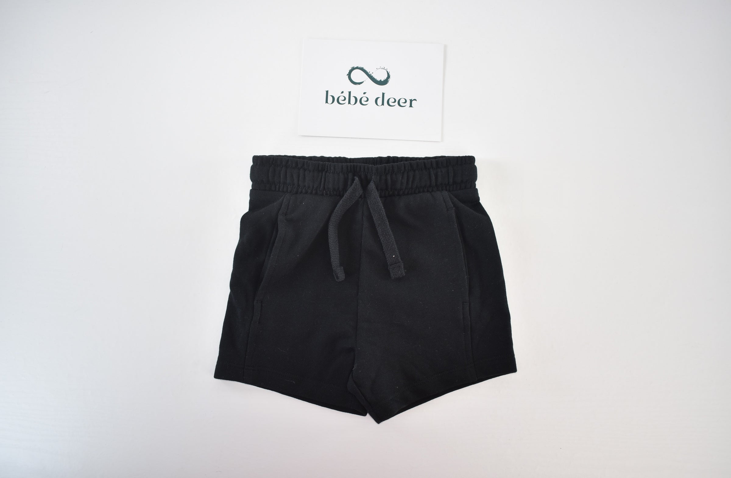 Black jersey shorts with pockets