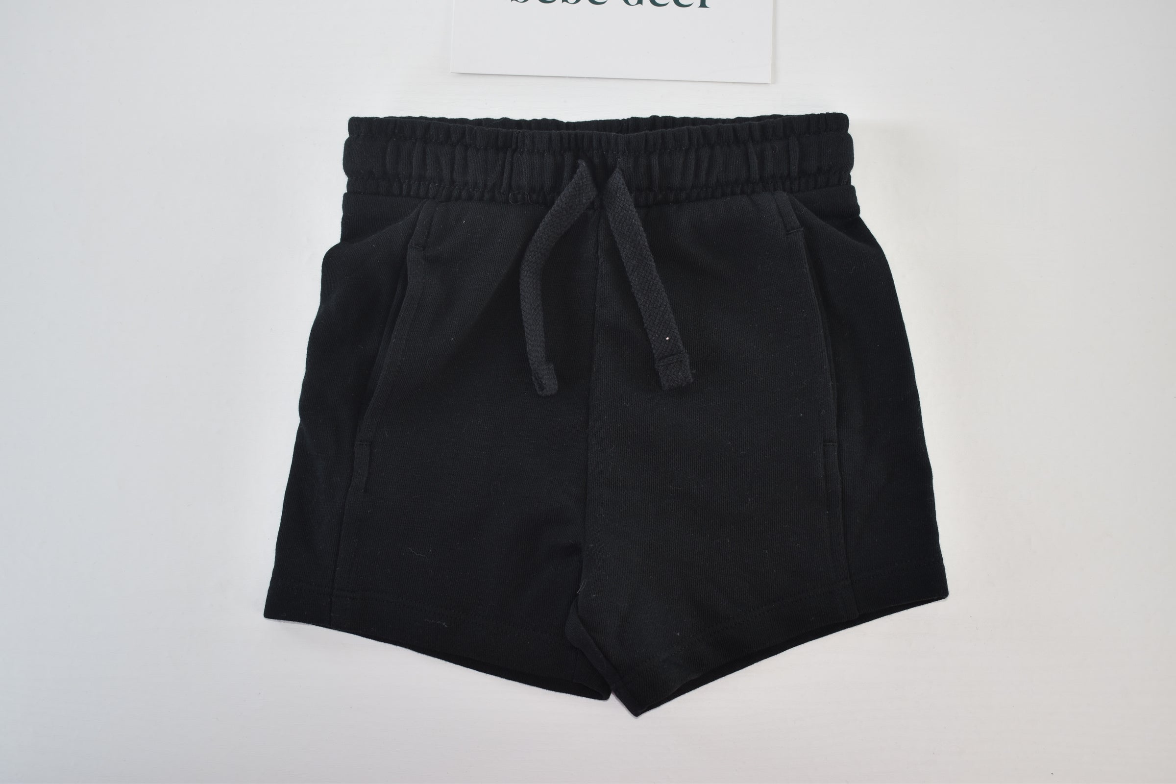 Black jersey shorts with pockets