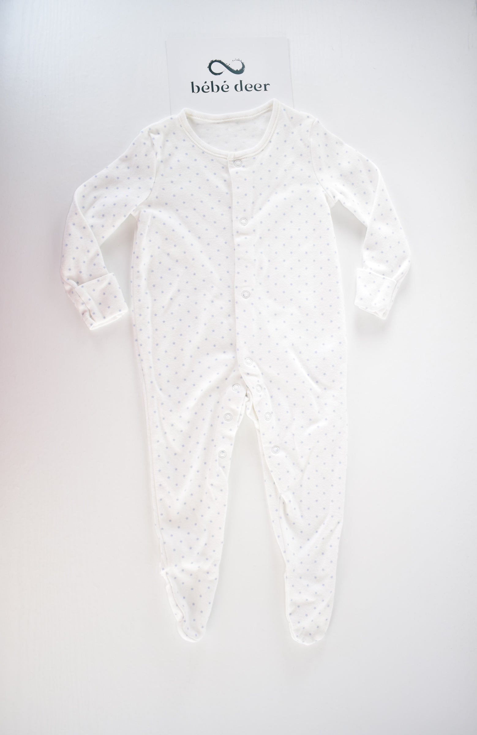White cotton sleepsuit with blue stars