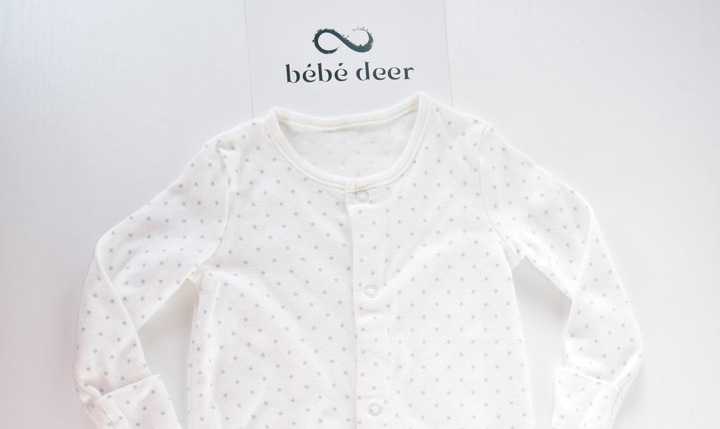 White cotton sleepsuit with blue stars
