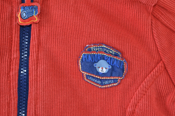 Veste orange à capuche zippée avec écusson brodé