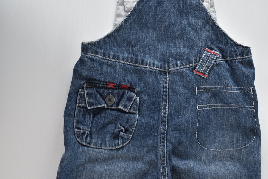 Denim dungarees with cargo pockets