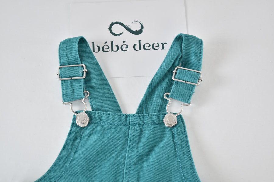 Turquoise dungaree shorts