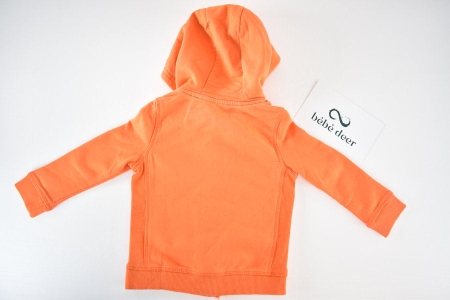Orange hooded jacket with Big Adventure badge
