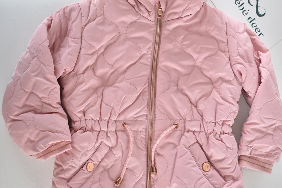Pink quilted hooded coat with faux fur trim