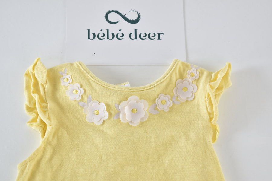 Yellow top with floral collar detail