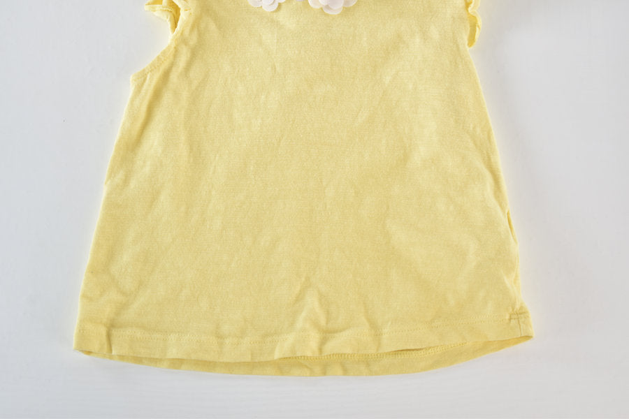 Yellow top with floral collar detail