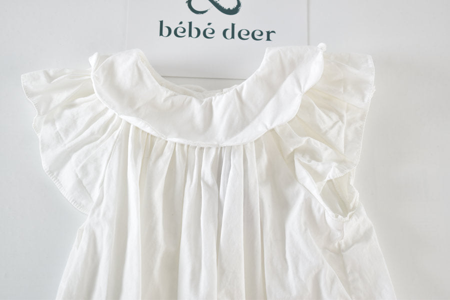 White frill top with peter pan collar