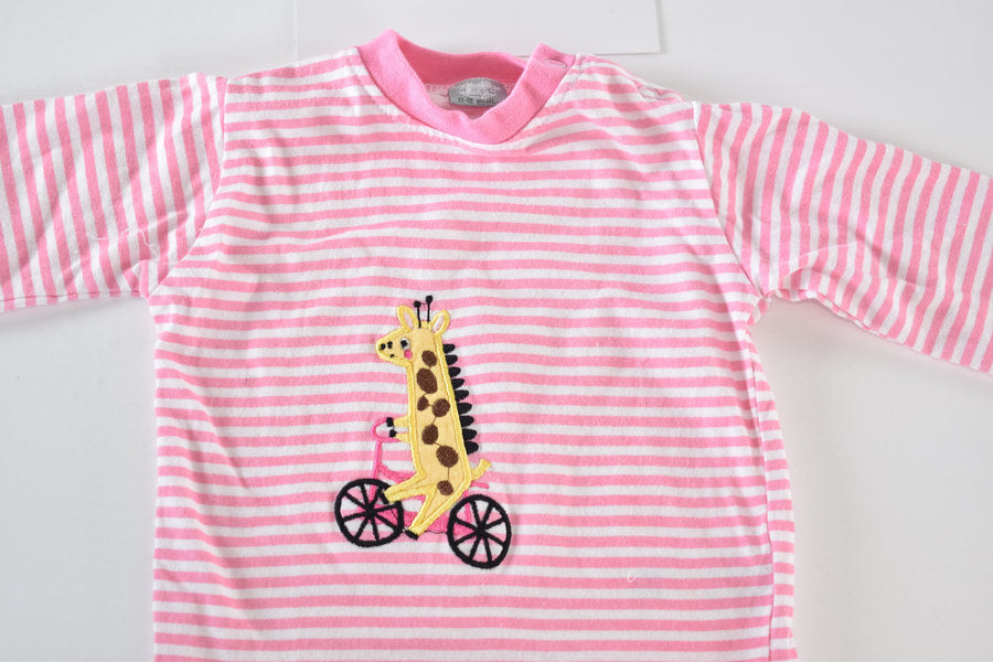 Striped top with embroidered giraffe