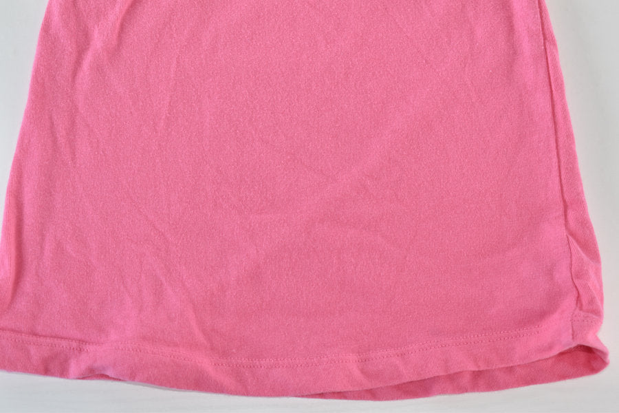 Pink sleeveless top with frilled sleeves