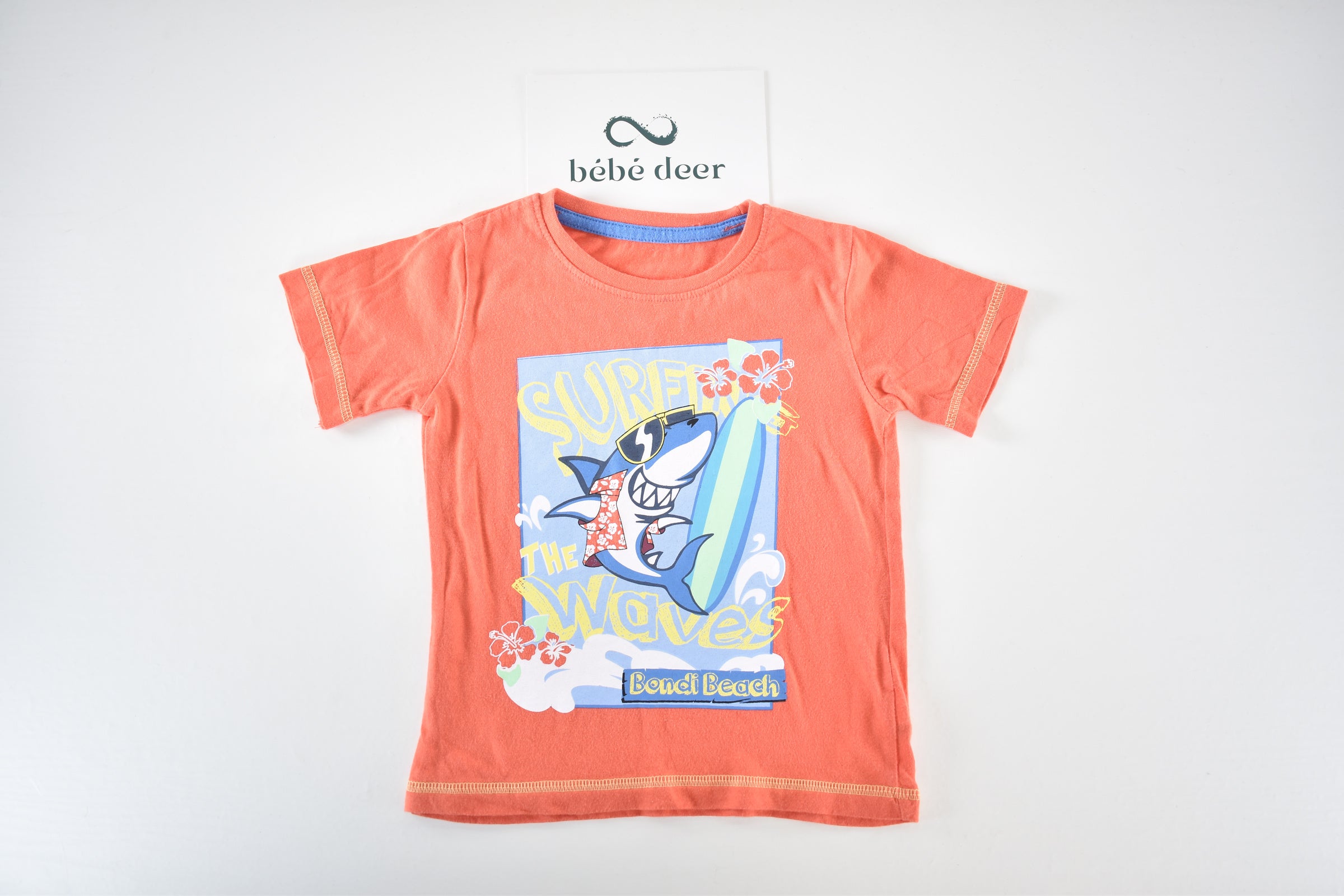 Top "Surf the waves" with surfing shark