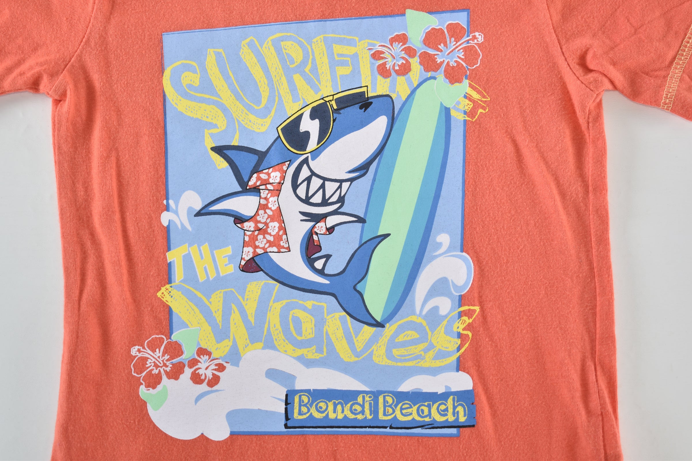 Top "Surf the waves" with surfing shark