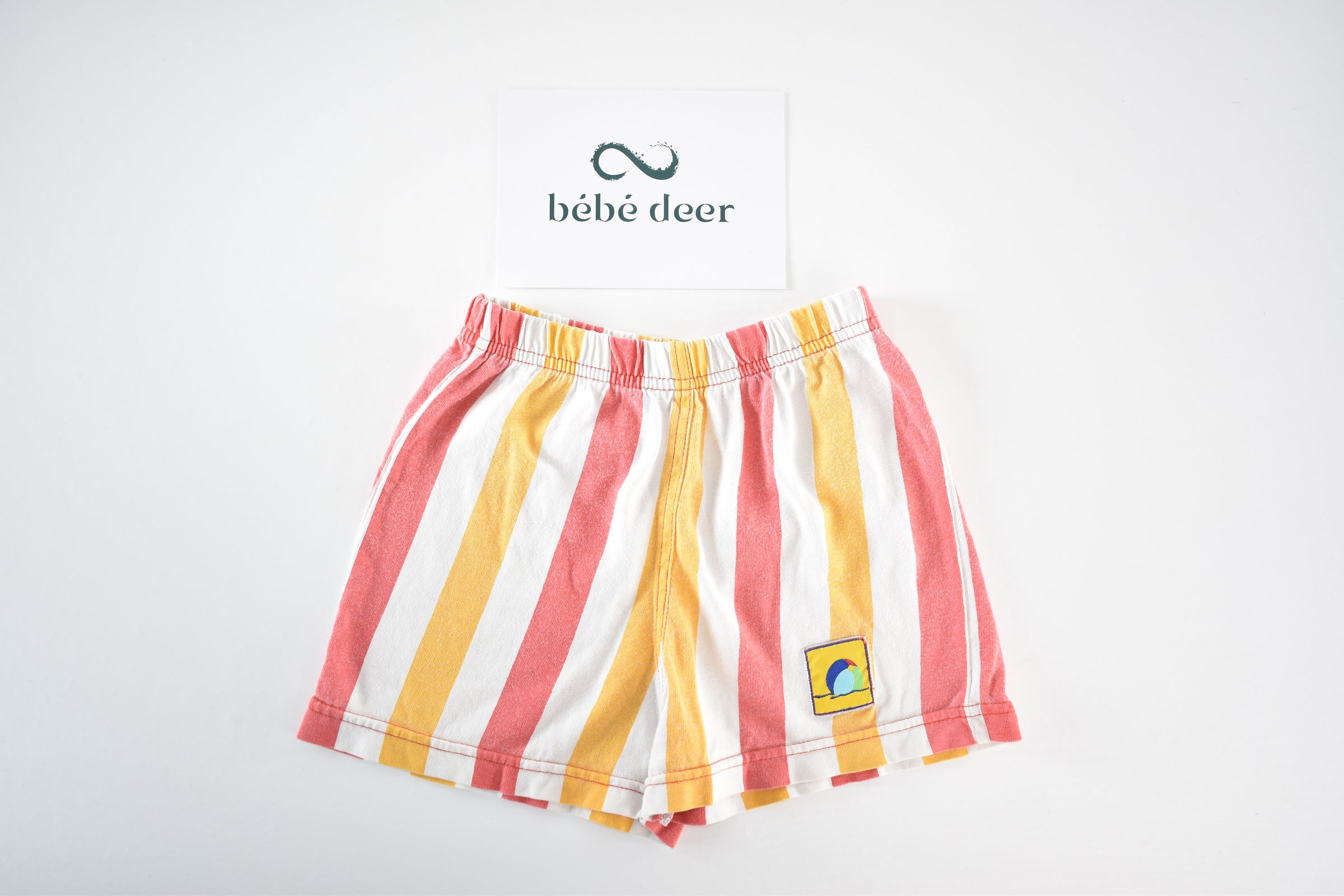 Striped shorts with beach badge