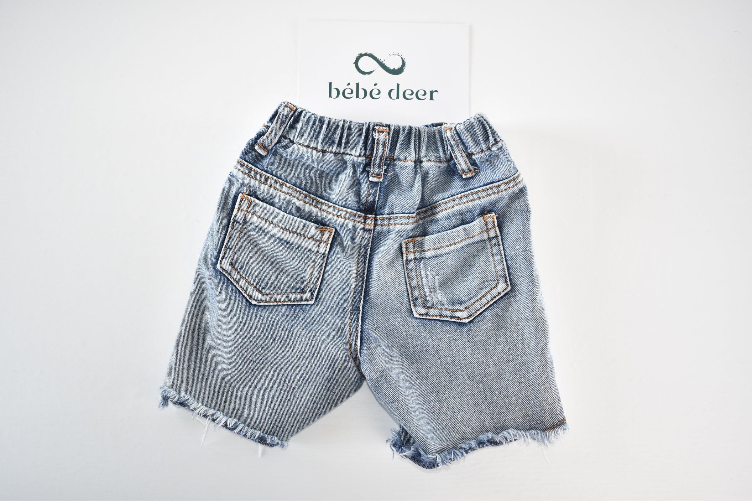 Distressed denim shorts