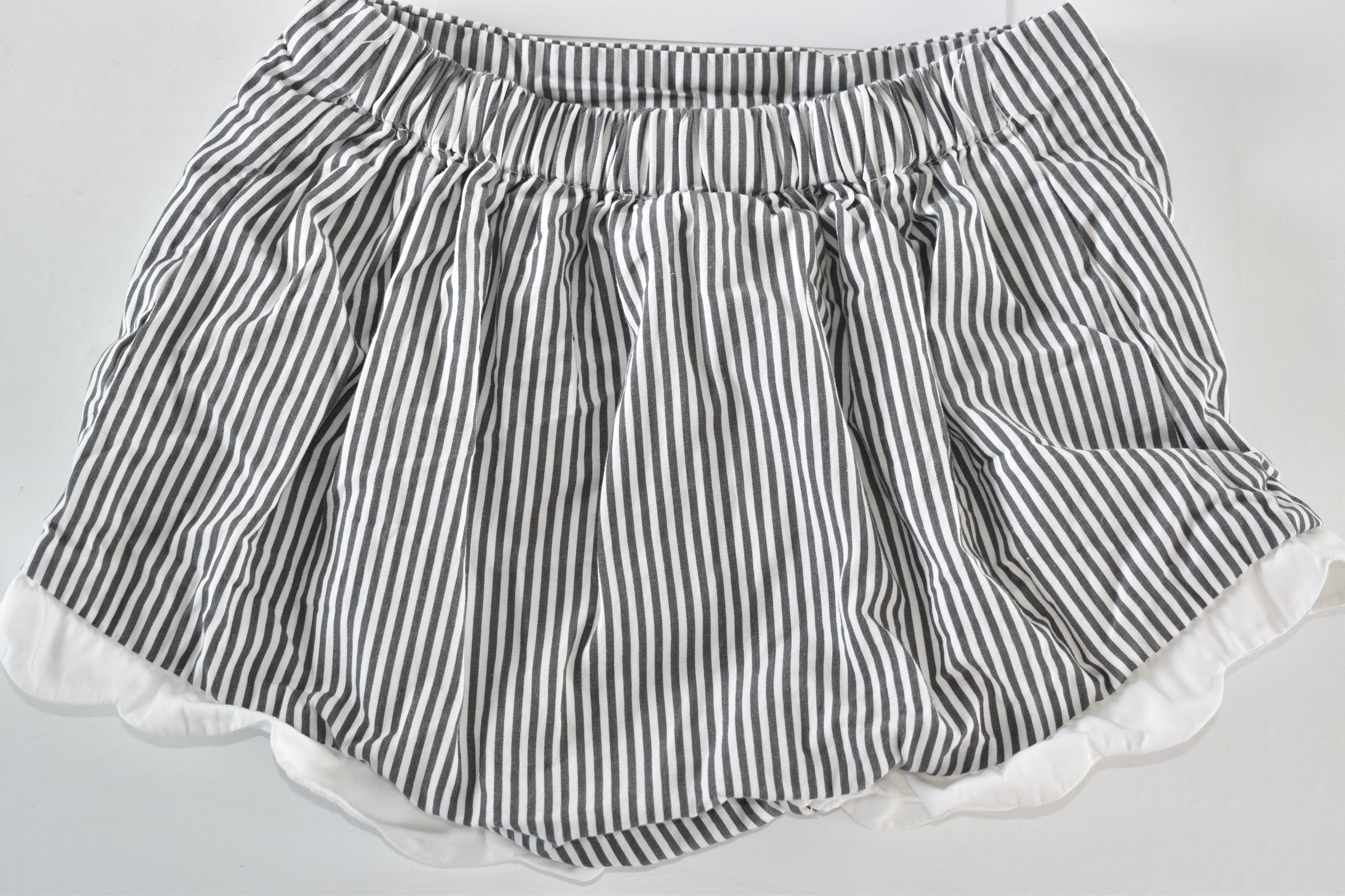 Striped shorts with frill trim