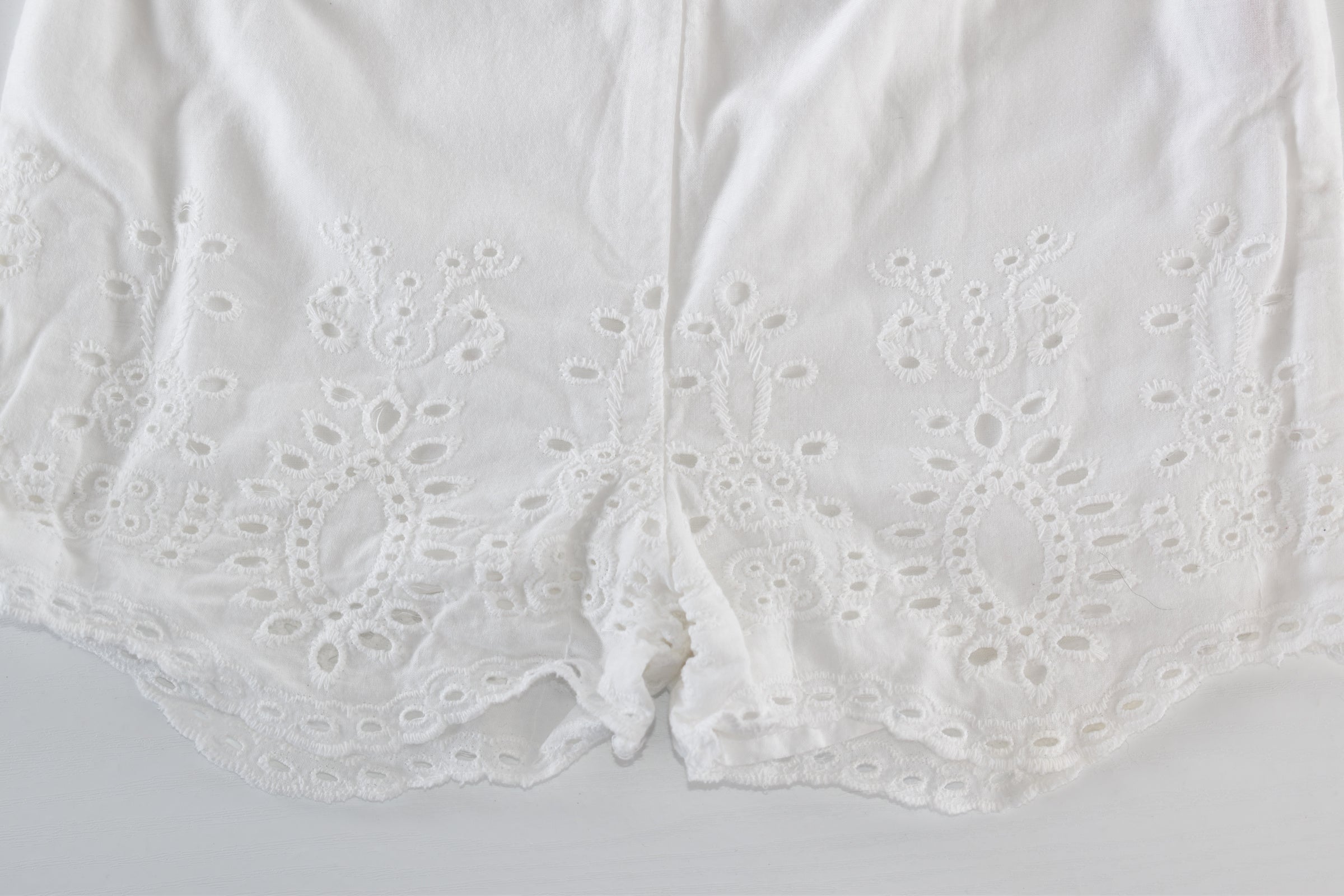 White broderie anglaise shorts