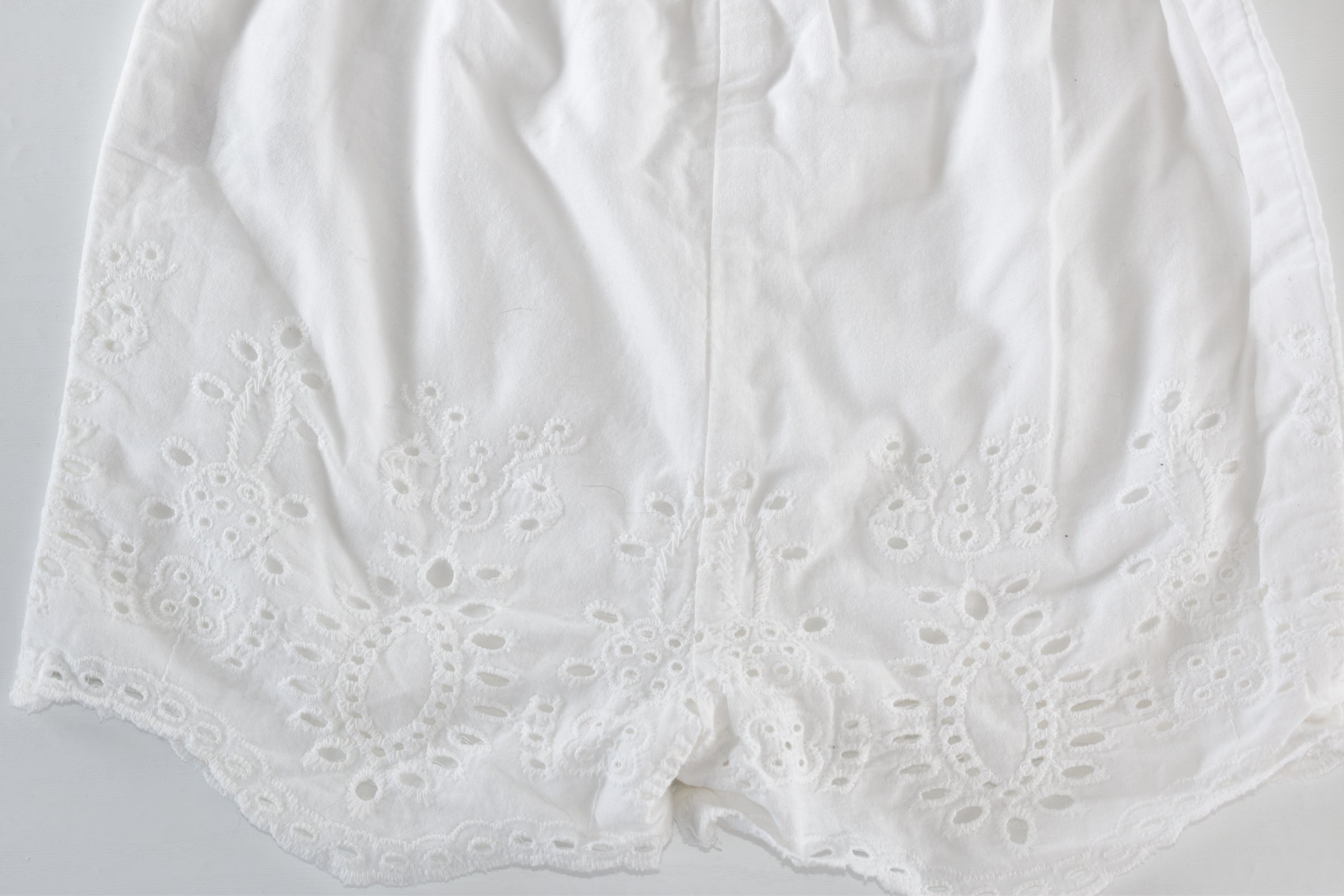 White broderie anglaise shorts