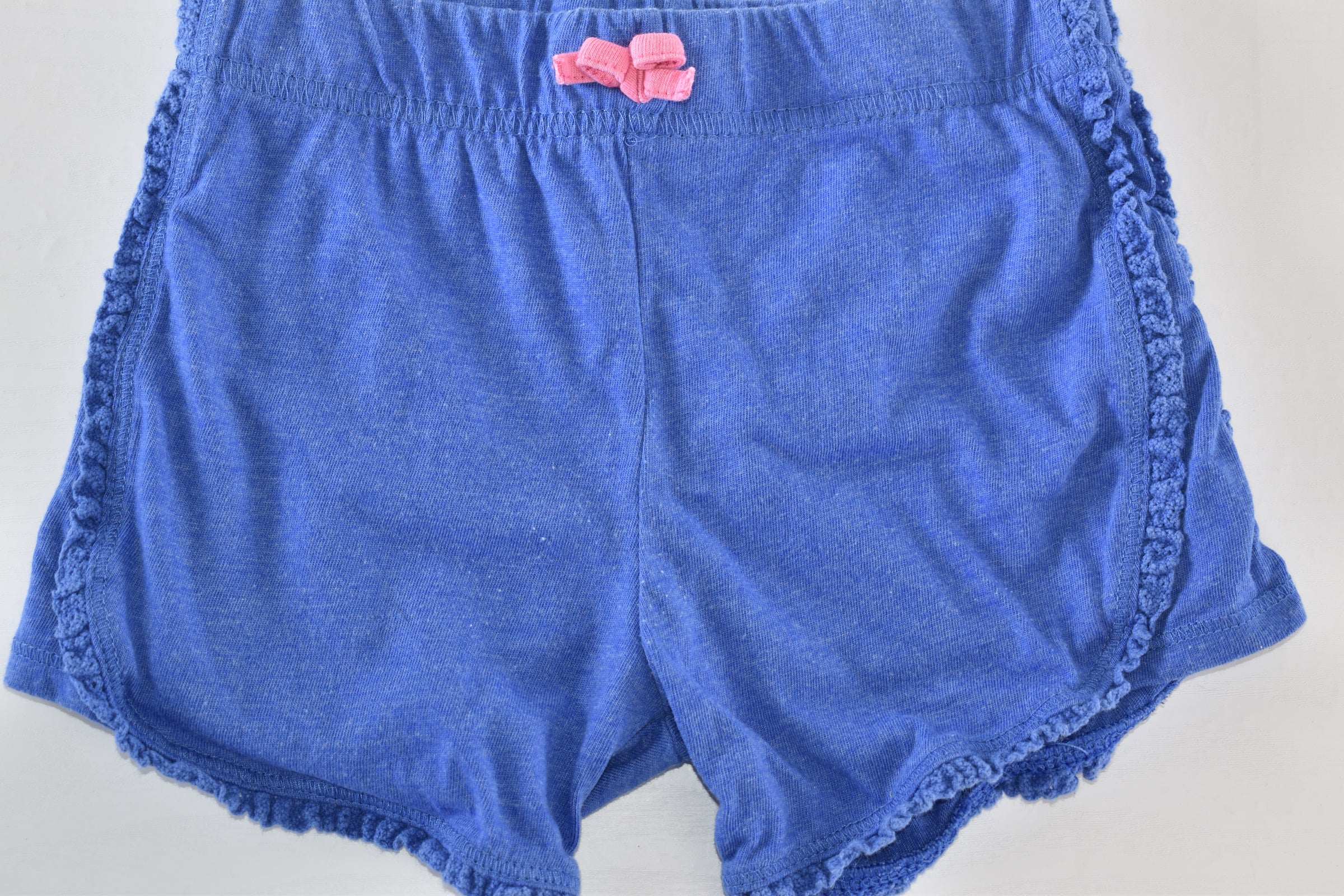 Blue soft shorts with trim