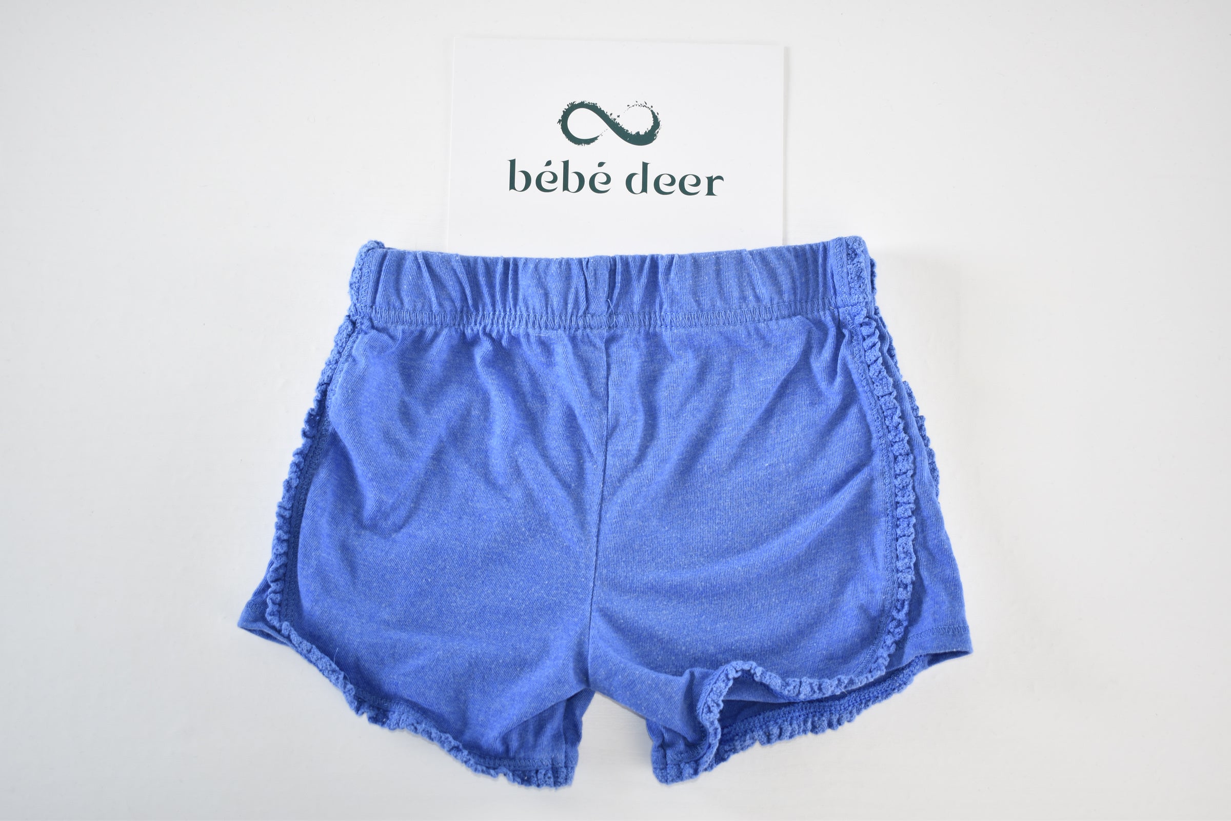 Blue soft shorts with trim