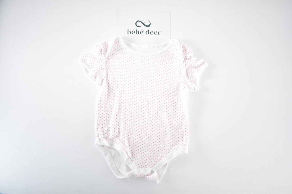Body with pink polka dots