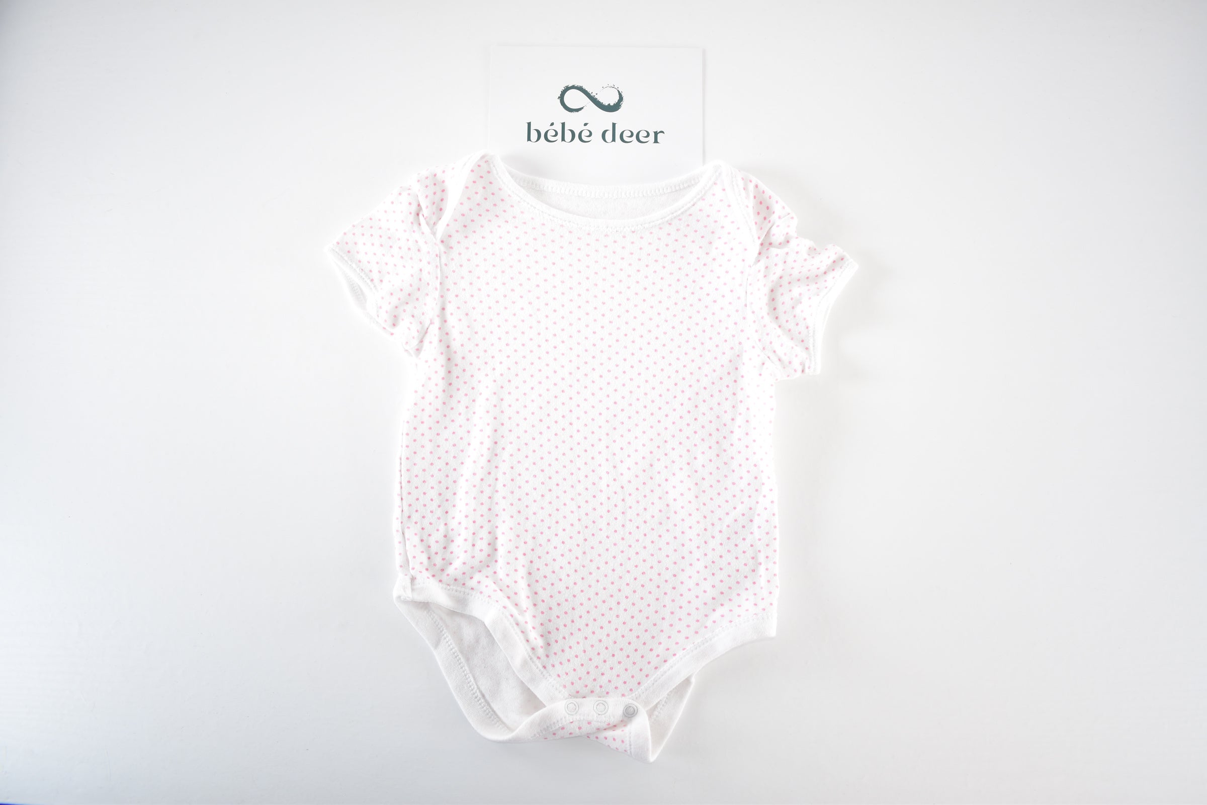 Body with pink polka dots