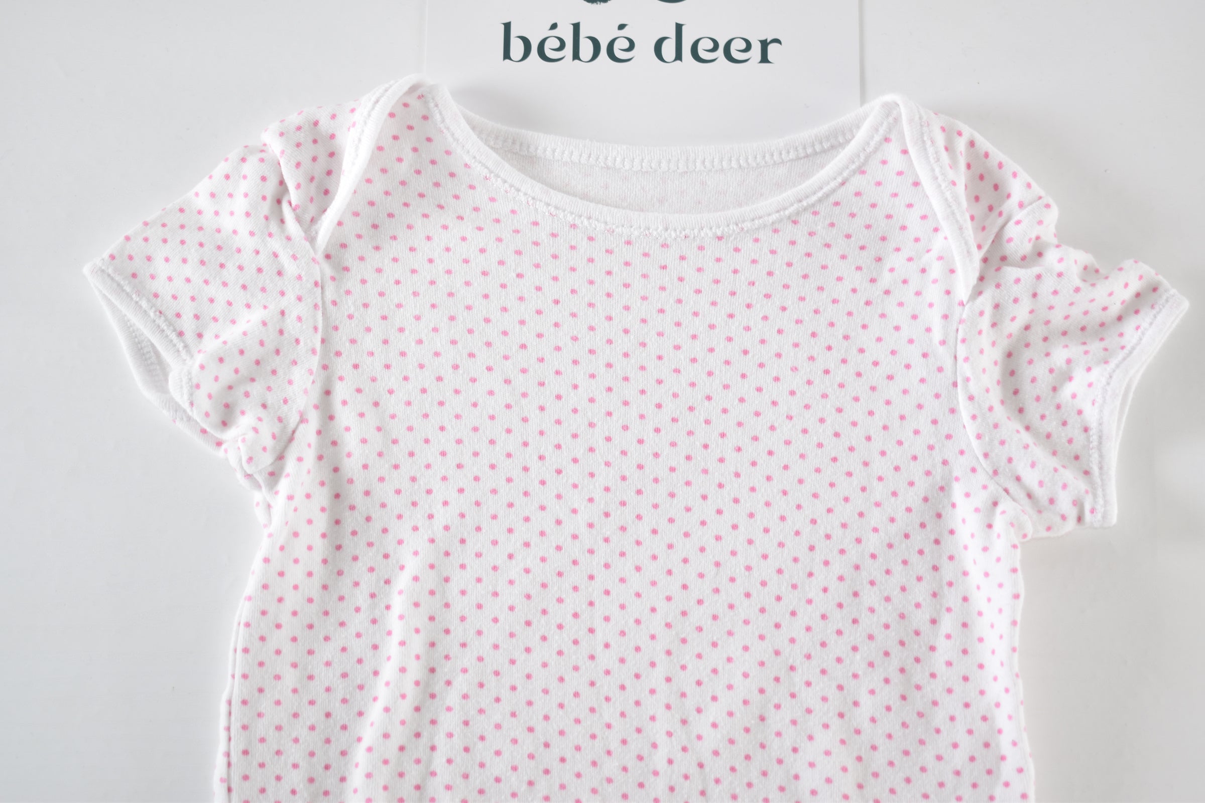 Body with pink polka dots