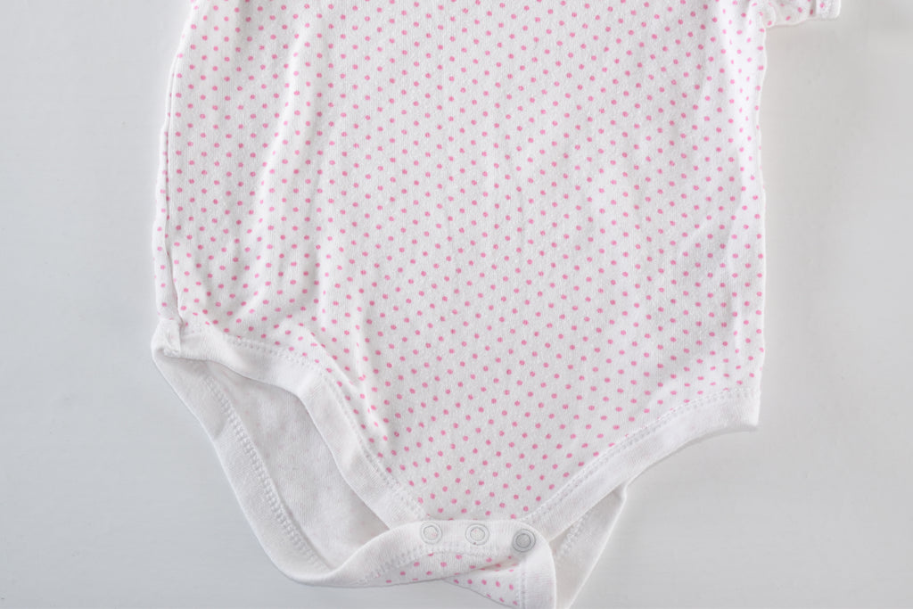 Body with pink polka dots