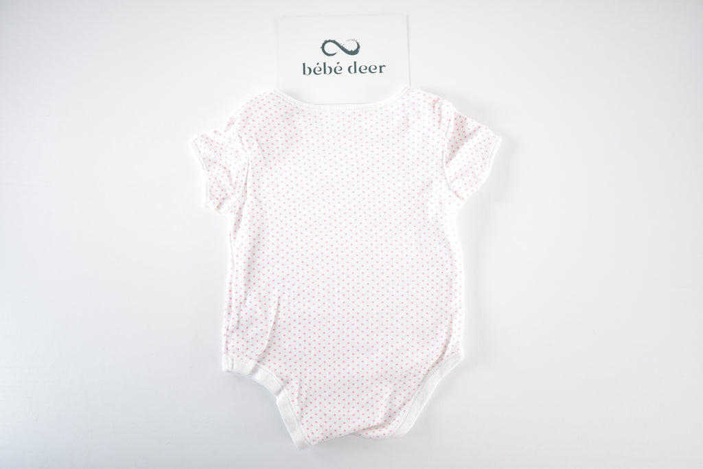 Body with pink polka dots