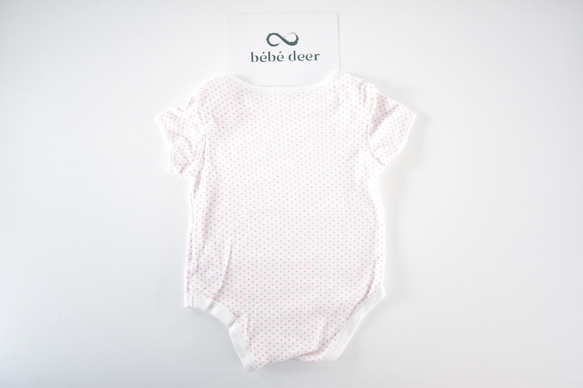 Body with pink polka dots