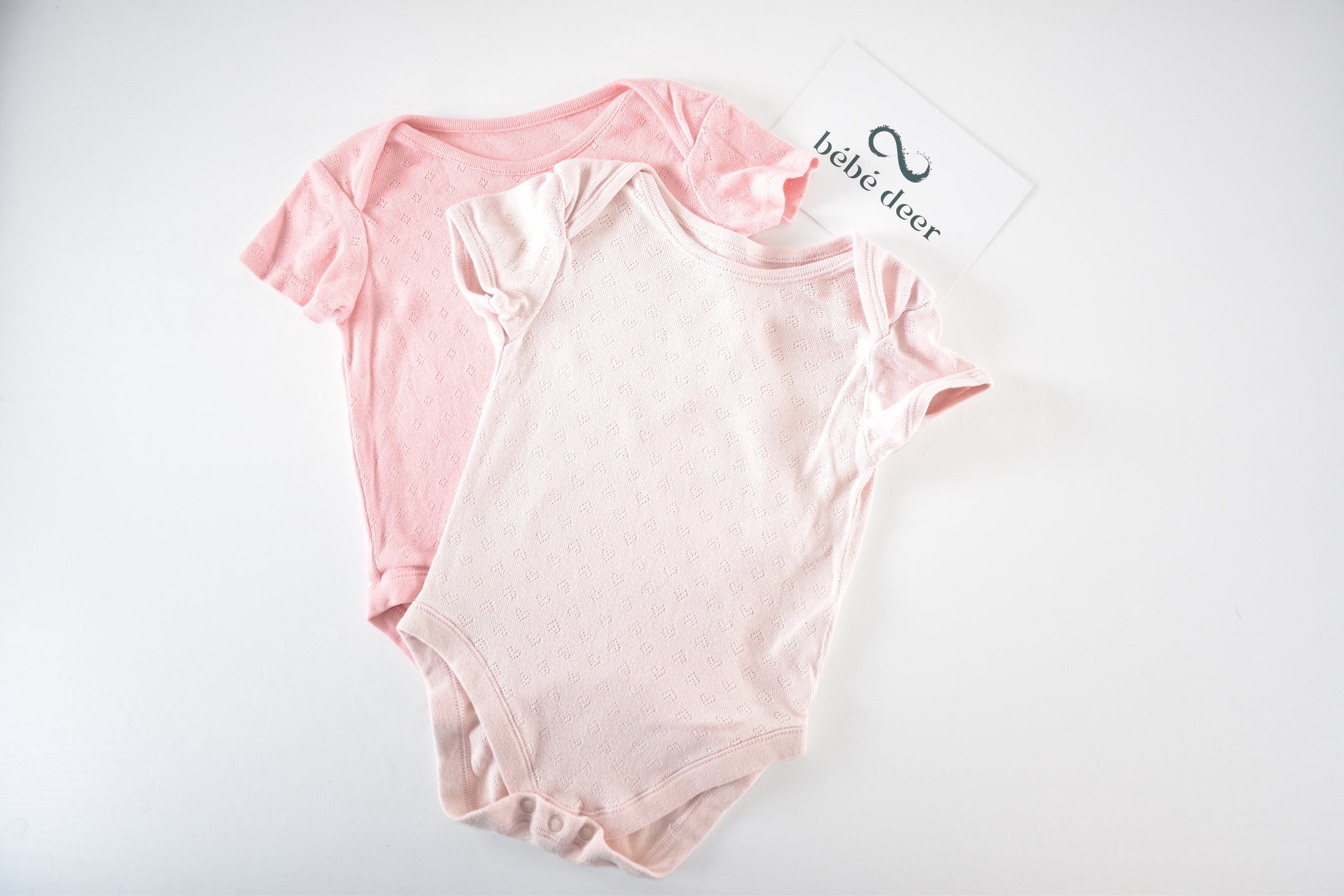Set of 2 pink pointelle bodies