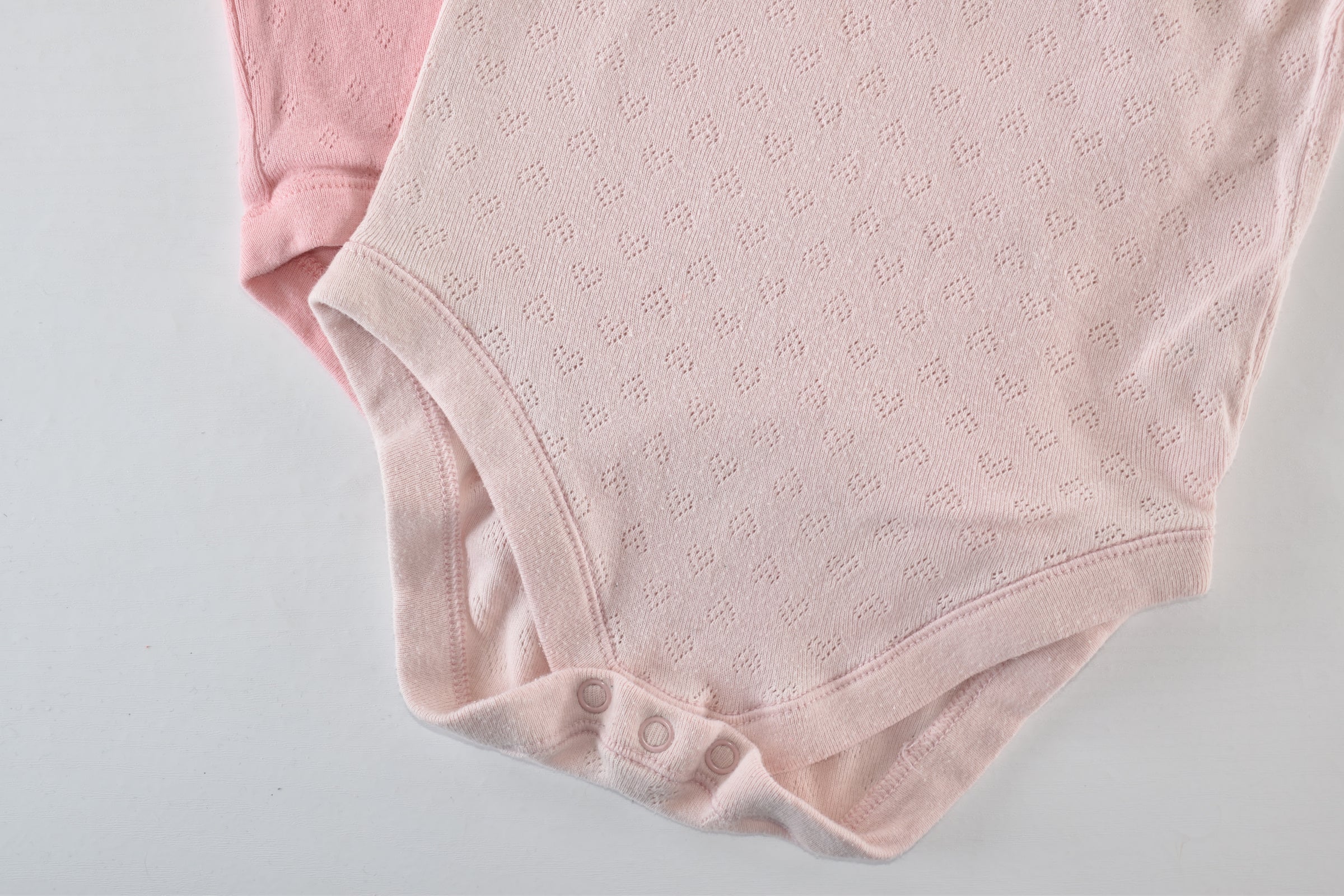 Set of 2 pink pointelle bodies