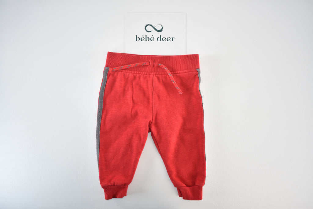Red trousers with grey side panels