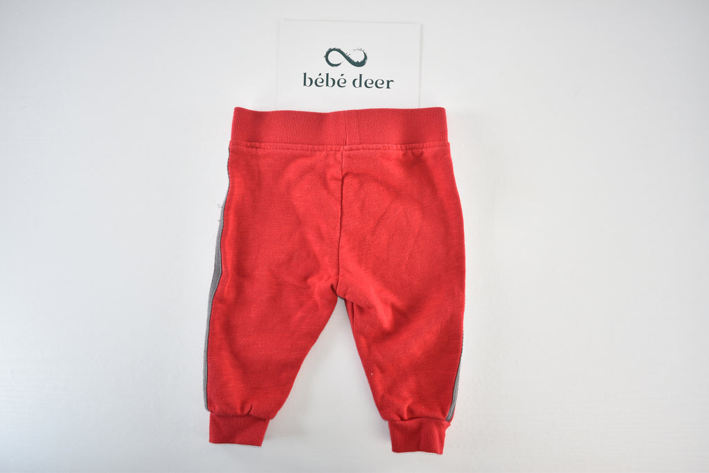 Red trousers with grey side panels