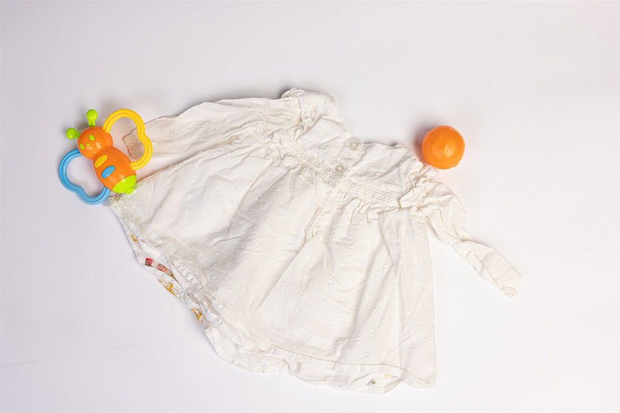 Dress with embroidered floral details