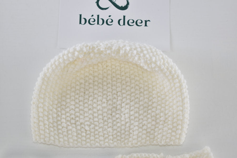 Handmade knitted newborn set